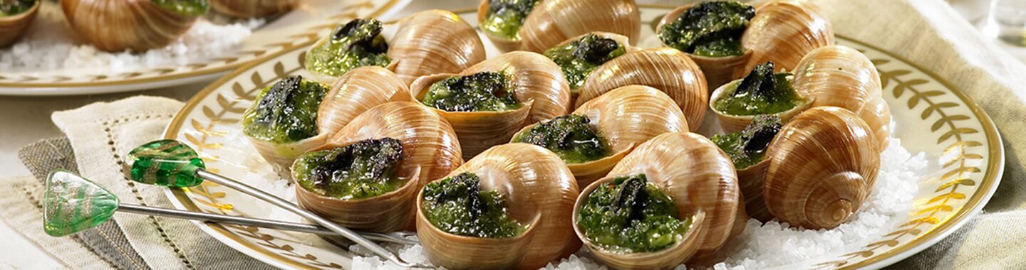 A plate with some Burgundy escargots