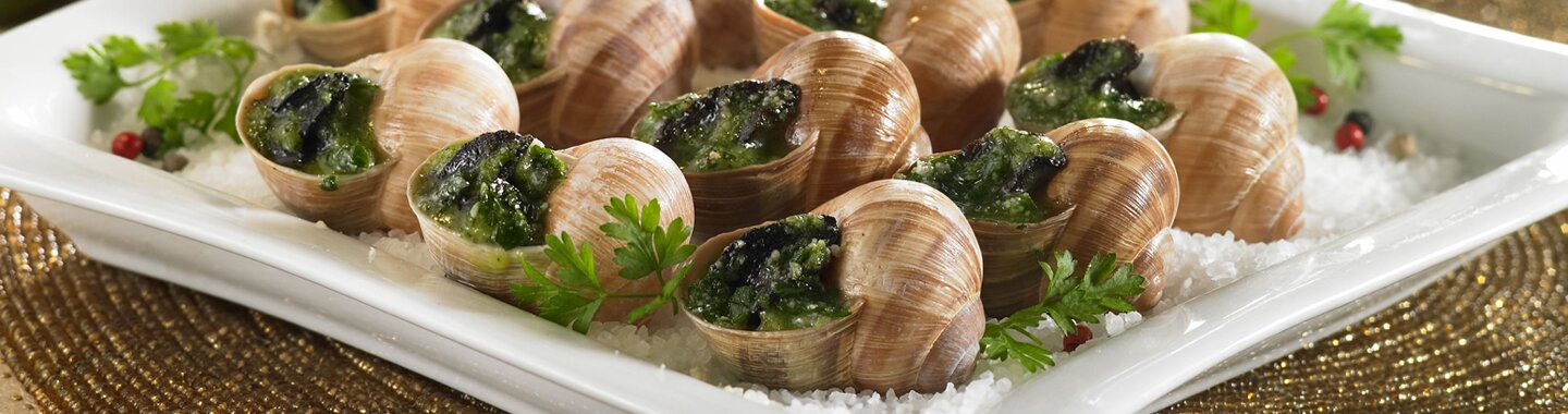 A cut-out of a plate with Burgundy escargots